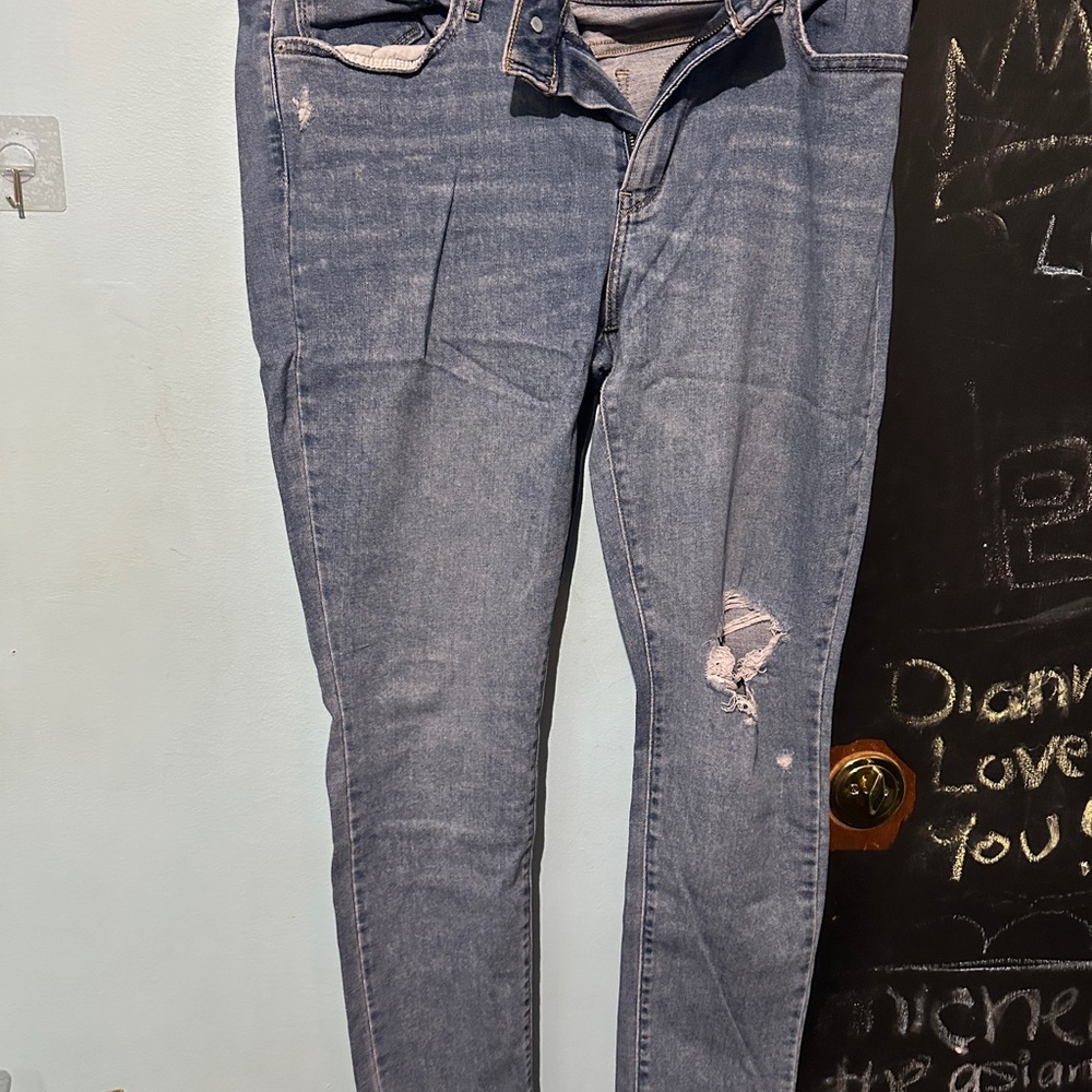 Distressed Blue Jeans